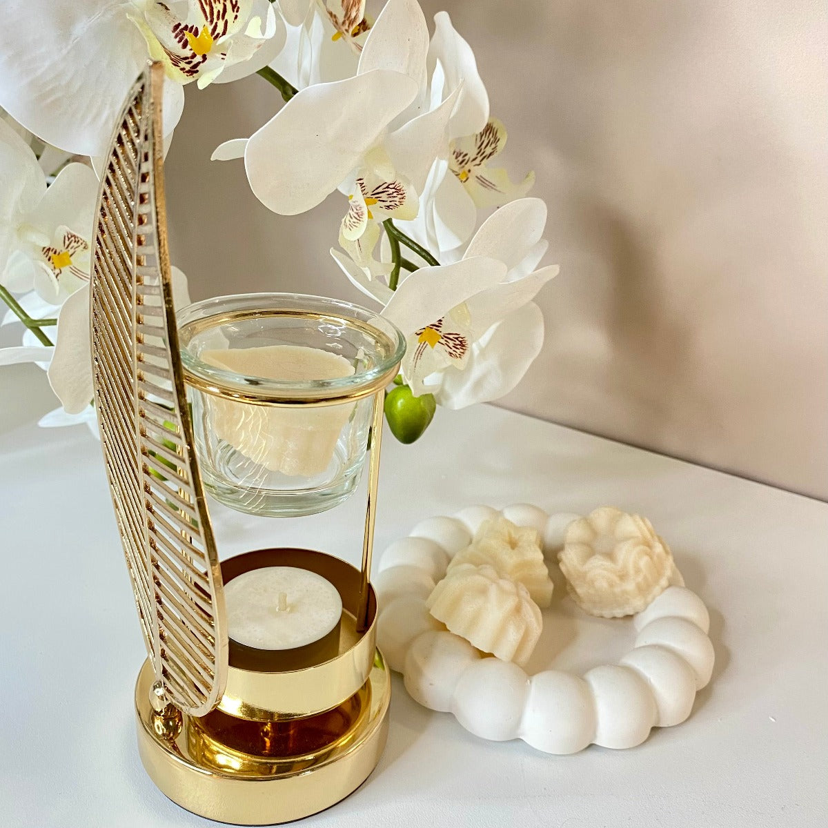 Le Brûle-parfum Palma avec sa feuille de palme en métal
